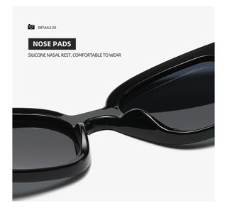 Lunettes de soleil à monture noire et verres gris